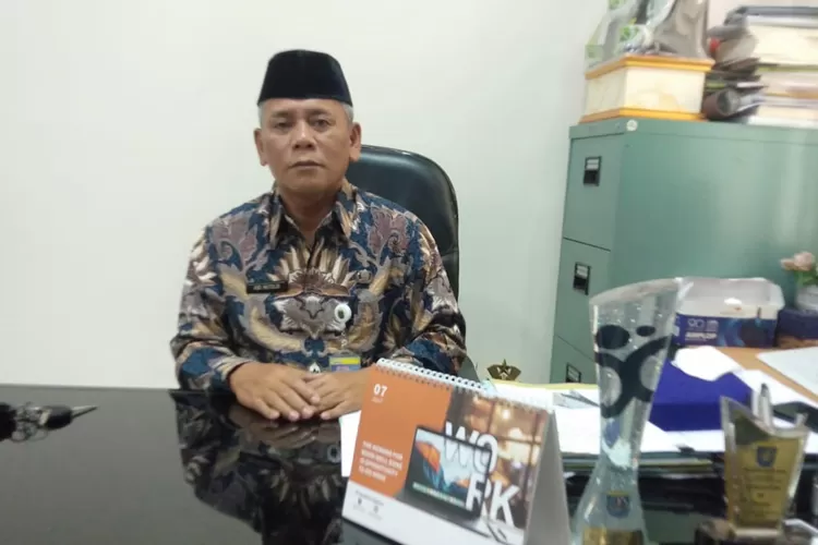 Camat Tapos, Abdul Mutolib 