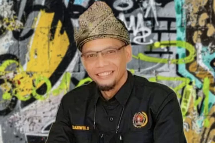 Ketua PWI Langkat Darwis Sinulinga