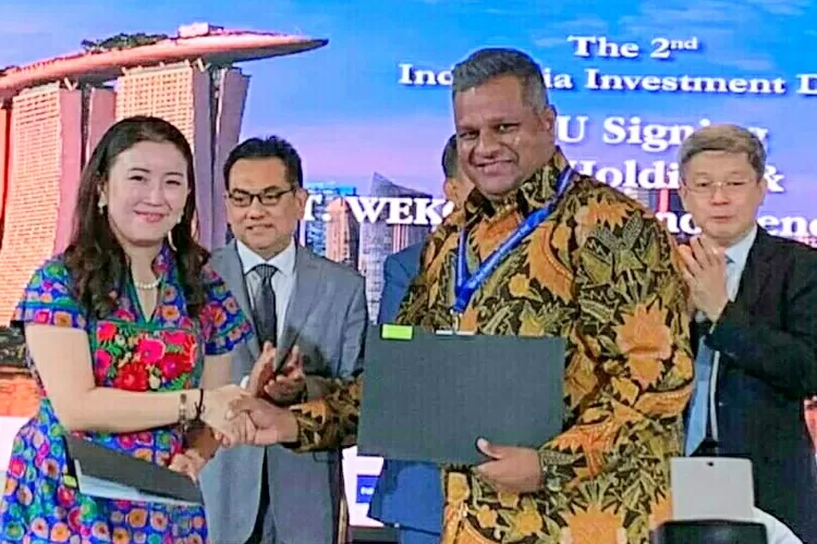  Fiona Chaw  CEO Amico Global Pte LTD (kiri) dan CEO RHT Holding Jayaprakash Jagateesan (kanan) disaksikan  Dubes RI Singapura, Perwakilan BKPM, serta Ketua KADIN Komite SG. (foto,ist) 