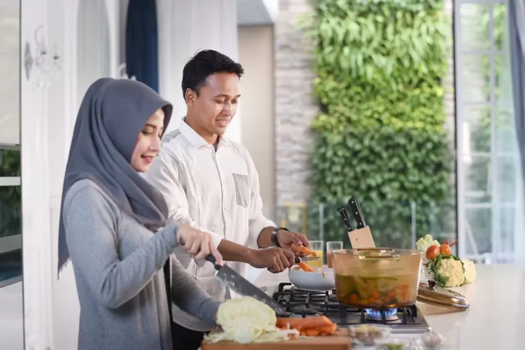 Memasak dengan menggunakan gas dari PGN  (istimewa)