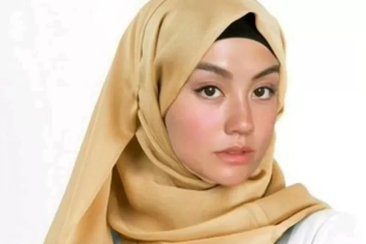 Agama Agnez Mo sekarang dipertanyakan, penyanyi ini langsung sekakmat dengan satu kalimat. (Twitter/ @Irtus_Laso)